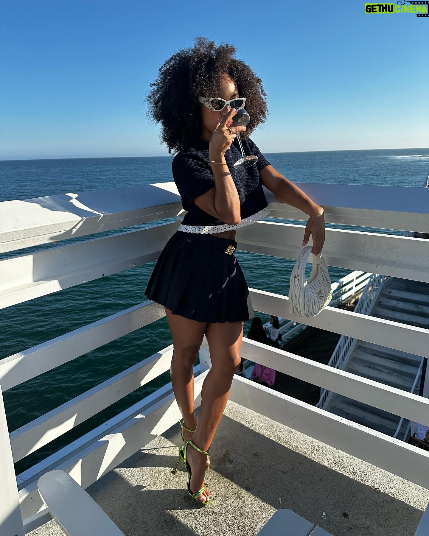 Logan Browning Instagram - @miumiu summer club 🌊🛥️ (authentic convos, luxe looks, perfect weather, that fun claw game with prizes, lobster rolls, vibey music, @georgiagetsby’s first performance, tarot, & ice cream!) thank you for having me 🤍 #miumiu #miumiuclub