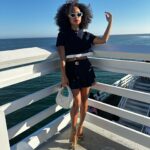 Logan Browning Instagram - @miumiu summer club 🌊🛥️ (authentic convos, luxe looks, perfect weather, that fun claw game with prizes, lobster rolls, vibey music, @georgiagetsby’s first performance, tarot, & ice cream!) thank you for having me 🤍 #miumiu #miumiuclub