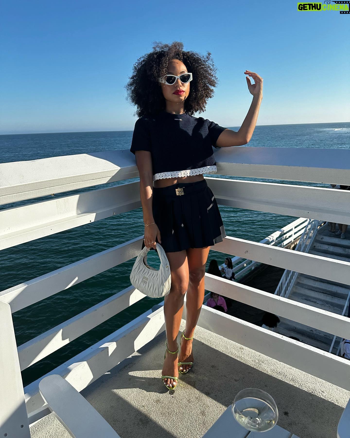 Logan Browning Instagram - @miumiu summer club 🌊🛥️ (authentic convos, luxe looks, perfect weather, that fun claw game with prizes, lobster rolls, vibey music, @georgiagetsby’s first performance, tarot, & ice cream!) thank you for having me 🤍 #miumiu #miumiuclub