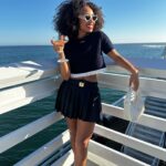 Logan Browning Instagram - @miumiu summer club 🌊🛥️ (authentic convos, luxe looks, perfect weather, that fun claw game with prizes, lobster rolls, vibey music, @georgiagetsby’s first performance, tarot, & ice cream!) thank you for having me 🤍 #miumiu #miumiuclub