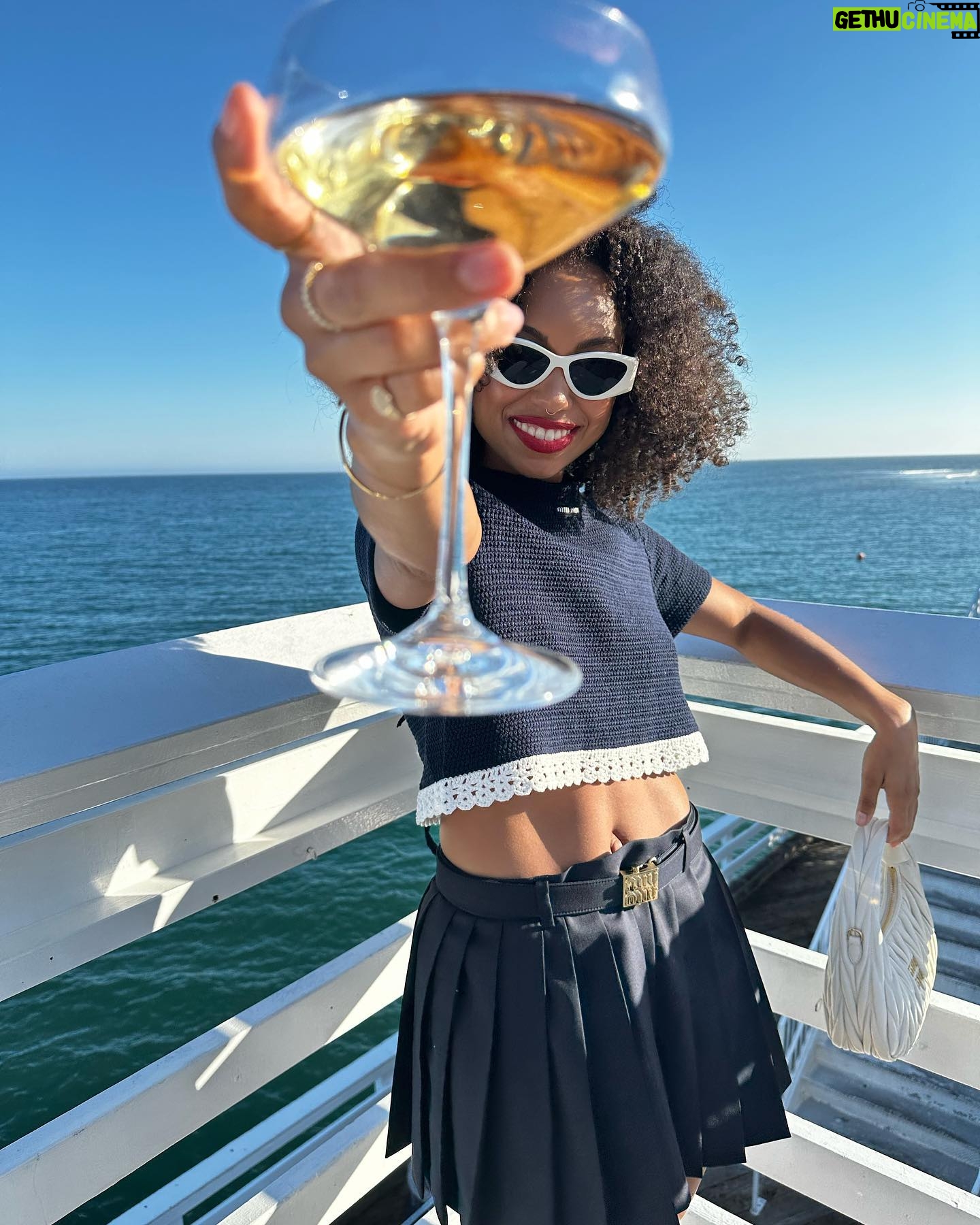 Logan Browning Instagram - @miumiu summer club 🌊🛥️ (authentic convos, luxe looks, perfect weather, that fun claw game with prizes, lobster rolls, vibey music, @georgiagetsby’s first performance, tarot, & ice cream!) thank you for having me 🤍 #miumiu #miumiuclub