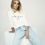 Louise Redknapp Instagram - Happy Sunday everyone, here’s a little preview of some of the pieces from my new Peacocks edit available online and in store now 🤍 xxx Top, Denim & Bag: @peacocks_fashion Photography: @rachell_photo *AD