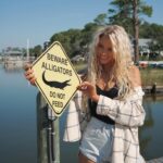 Lucie Donlan Instagram - Day 2 of the Alabama road trip and what can I say, it’s been the dreamiest day of kayaking, nature and sunsets. 🇺🇸🐬🌲 We drove from Mobile to Gulf Shores to kayak down the stunning Oyster Bay that connects to the ocean, so we were surprised by dolphins swimming beside the kayaks which was a moment to remember. 🐬 After the Kayaking trip, we then took a drive down to Orange Beach where we hung out on the long stretch of white sand beaches. I also enjoyed checking out the Flora-Bama Lounge with country music and drinks right on the beach. Then, we ended with this magical day watching the sun set across the beach. @visittheusa @alabamatravel #VisitTheUSA #SweetHomeAlabama AD