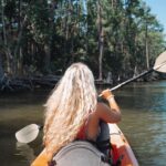 Lucie Donlan Instagram - Day 2 of the Alabama road trip and what can I say, it’s been the dreamiest day of kayaking, nature and sunsets. 🇺🇸🐬🌲 We drove from Mobile to Gulf Shores to kayak down the stunning Oyster Bay that connects to the ocean, so we were surprised by dolphins swimming beside the kayaks which was a moment to remember. 🐬 After the Kayaking trip, we then took a drive down to Orange Beach where we hung out on the long stretch of white sand beaches. I also enjoyed checking out the Flora-Bama Lounge with country music and drinks right on the beach. Then, we ended with this magical day watching the sun set across the beach. @visittheusa @alabamatravel #VisitTheUSA #SweetHomeAlabama AD
