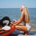 Lucie Donlan Instagram - Day 2 of the Alabama road trip and what can I say, it’s been the dreamiest day of kayaking, nature and sunsets. 🇺🇸🐬🌲 We drove from Mobile to Gulf Shores to kayak down the stunning Oyster Bay that connects to the ocean, so we were surprised by dolphins swimming beside the kayaks which was a moment to remember. 🐬 After the Kayaking trip, we then took a drive down to Orange Beach where we hung out on the long stretch of white sand beaches. I also enjoyed checking out the Flora-Bama Lounge with country music and drinks right on the beach. Then, we ended with this magical day watching the sun set across the beach. @visittheusa @alabamatravel #VisitTheUSA #SweetHomeAlabama AD