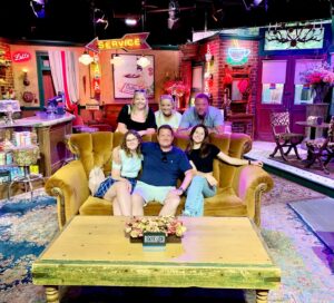 Lucy Davis Instagram - This was a magical day. Taking my uk friends on the @wbtourhollywood Even though I’ve been doing this job for 30 years I still am in awe of it and how everything is made. Thanku so much to @bigk1701 for being our delightful guide for the day, and to @wbtourhollywood for arranging it and letting us come. 
PICTURES:
1. Does it need describing?! The @friends opening title sequence sofa and fountain
2. Inside the exact replica of #centralperk 
3. #centralperk cafe with @itsmeritavolk 
4. #harrypotter all the letters arrive
5. Harry Potter #thecupboardunderthestairs 
6. Swinging the #wonderwoman1984 lasso
7. Um… I’ve forgotten the name of this one…
8. Forced perspective table used in #thehobbit 
9. One of the outdoor cabins used for many different shows. One being the cabin in #dexter where #jamesdoakes is held prisoner and is killed
10. Our wonderful guide @bigk1701 
#wbtourhollywood #friendstvshow #friendsfountain #sightseeingtour #touristlife