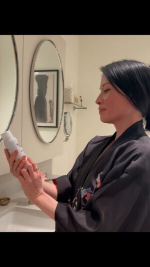 Lucy Liu Instagram - Beauty secret! When I want to look fresh but don't want to put on makeup: I do my usual skin care routine, then a quick mist of #bronzeglow @roxannerizzo 
 For makeup days: I mist on top of finished look as a setting spray which gives my skin a gorgeous glow! #travelsize #vegan