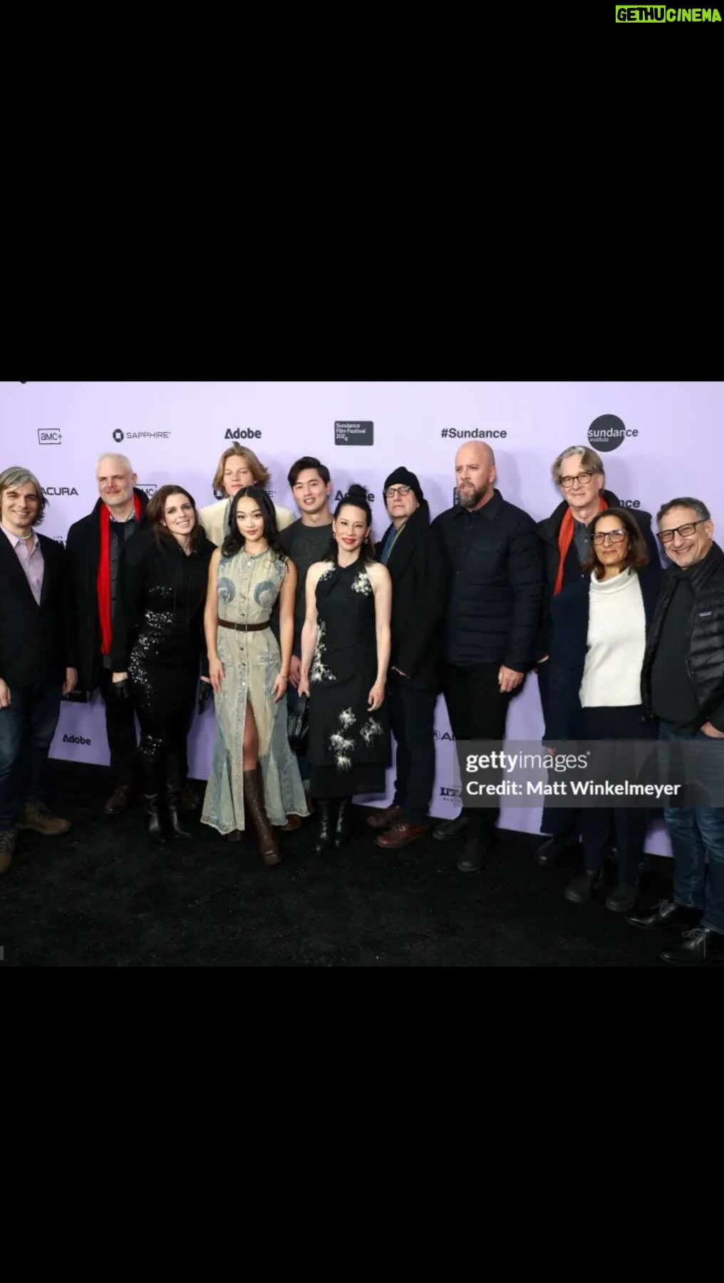 Lucy Liu Instagram - @sundanceorg Experience of a lifetime with #stevensoderbergh @dgkoepp ! An absolute dream come true to work with two giants in the industry- both continue to scale and inspire exciting new landscapes for storytelling. Together with powerhouse @sullivangrams and a trio of fresh vibrant talent @callina.liang @eddymaday @westmulholland along with unforgettable @juliafox - one canβt help but have 36 hours of laughter, chills & coffee! Also, at Sundance, a top knot and some red lipstick turn day into night in a snapπ«°π€© π: @31philliplim ππ»ββοΈπ: Me! π: @tito_pedrini_jewellery PomPom Hat: @alysseandco @sunrisecollective.us π½: @normakamali π: @maxmara