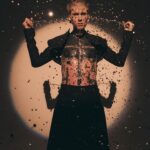 Machine Gun Kelly Instagram - more drip💧@machinegunkelly for the liquid issue of @kingkongmagazine. photographer: @kennethcappello styling: @thejordanboothe grill artist @alligatorjesus assist: @elisa_jane hair: @dimitrishair makeup: @ghost_artistry_ set @_bradenyoung studios: @milk