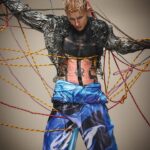 Machine Gun Kelly Instagram - more drip💧@machinegunkelly for the liquid issue of @kingkongmagazine. photographer: @kennethcappello styling: @thejordanboothe grill artist @alligatorjesus assist: @elisa_jane hair: @dimitrishair makeup: @ghost_artistry_ set @_bradenyoung studios: @milk
