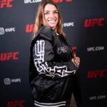 Mackenzie Dern Instagram - I LOVE my special edition jacket for the NYC card and the UFC’s 30th anniversary! 😍On sale only at MSG @ufcstore • • EU AMO a minha jaqueta da edição especial para o card de Nova Iorque e o aniversário de 30 anos do UFC! 😍 Essa jaqueta está a venda apenas na MSG @ufcstore