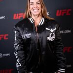 Mackenzie Dern Instagram - I LOVE my special edition jacket for the NYC card and the UFC’s 30th anniversary! 😍On sale only at MSG @ufcstore • • EU AMO a minha jaqueta da edição especial para o card de Nova Iorque e o aniversário de 30 anos do UFC! 😍 Essa jaqueta está a venda apenas na MSG @ufcstore