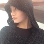 Mackenzie Foy Instagram - Thank you to my beautiful Nana who made me this incredible hooded scarf! Now I can dramatically look off into the distance in style😊