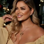 Madeleine Matar Instagram - Counting down the days – just one month until Christmas magic unfolds! 🎄✨ #CountdownToChristmas #MadeleineMatar #مادلين_مطر Dressed by @sheikhastyleboutique @dressroom.qa Hair by @manal_majdlani Makeup by DeemaAl khoury