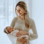 Madisson Hausburg Instagram - Happy Mother’s Day (and happy three months to Sunday)! 🩷 Three years ago on this holiday, I announced to my family that I was pregnant and we all celebrated my first Mother’s Day together. After Elliot died, Mother’s Day became a very heavy day for me. I never questioned or doubted my title of mom, but motherhood is so much more complicated and confusing without a living child to hold. Today, I am so grateful to celebrate being a mom to both of my children even if it’s not in the way I hoped…with both of my babies earthside. And although my role as mom looks drastically different now than in years past, my love for Elliot and Sunday remains as strong as ever. Sending extra love and a big hug to those whose hearts feel heavy today. To those who are missing their mothers, to those who are missing their children, and to those whose arms feel so terribly empty…I see you. You are not alone. And as always…I miss you so so very much, my sweet Elliot. Today and everyday. Thank you for making me a mom🪽
