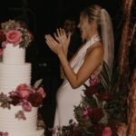 Madisson Hausburg Instagram - 10.21.21 ❤️ My wedding was literally a dream. I was 7 months pregnant with Elliot and I wouldn’t have wanted it any other way. I am so grateful for all the incredible people and vendors who made this day possible. Event planner: @oroeventco Flowers: @tailoredtwig Venue: @misionlagoestate Rentals: @gabroeventservices Photography: @paigestellutophoto Videography: @onlywavetv Accommodations: @hardrocktampa Cake: @elisespieces22 Hair: @cheyanne_hair Make up: @melissa_colletteartistry Wedding dress: @stefanienaylor Bridesmaids dresses: @mumuweddings Catering: @cblundys Music: @dj_juicy_one & @candi_theviolinist Photo booth: @posyexchange Neons: @novachrome_design_studio And a special shout-out to all our family and friends and SK film crew who joined us on this special day! Watch it all begin to unfold tonight on Siesta Key at 9pm💕