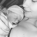 Madisson Hausburg Instagram - Happy two month birthday, Elliot Angel Soto 🕊 Two months ago, at the very end of my healthy and uneventful pregnancy, I noticed my baby stopped moving. Ish took me to the hospital and there was no heartbeat. I’ve never heard anything more deafening than the lack of a heartbeat on an ultrasound at 9 months pregnant. My whole world collapsed in that moment. I was immediately induced for labor. I spent two days in labor with my baby’s lifeless body inside me. I heard babies crying and families cheering next door, all while I was experiencing so much pain physically and emotionally. I gave birth to baby Eli at 2:09am on Sunday, December 12th. It was immediately evident to the doctors how Elliot had died. His cord was tied in a true knot and was wrapped around his neck twice. These were the worst moments of my life… But what followed was simply magical. The nurse handed me the most beautiful boy in the world. He was absolutely perfect. I can’t even begin to describe the amount of pure love and pride I felt with my baby. Ish and I created such an incredible little human, and I finally got to meet him. I wouldn’t trade those moments for the world!! I would do absolutely anything to have you in my arms again, Tiny 🤍 It’s extremely bittersweet revisiting those days at the hospital. I haven’t even begun to unpack the trauma and the weight that they carry. The past two months feel like a blur. The grief is all-consuming. I simply don’t know how to move forward without my baby, yet somehow the time still passes and I’m still here…just surviving. I could not do it without my incredible husband, my sisters, my parents, my friends, and especially all the fellow loss moms I have met along the way. I am so so thankful to have this platform to share Elliot with ALL of you. The outpouring of love has been such a light for me in these darkest of days. So, THANK YOU 🙏 I love you, I love you, I love you, baby Angel 👼🏻