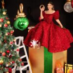 Malak Koura Instagram - Wishing everyone a Merry Christmas 🎄🎁⁣ Dress by: @samo_hagras ⁣ Christmas decorations: @eventsbyyasminmedhat ⁣ Jewellery: @michaelorojewellery Makeup: @henda.mohsen ⁣ Hair: @hemajoe_hairstylist ⁣ Photography: @abdallaphotography