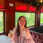 Mamrie Hart Instagram – I’ve been wanting get on board this beauty for a minute and got to do it with a couple of babes. Champagne. Gingerbread creme brûlée. Risotto. The views. The vibes. I felt like a real classy broad. Love me some @winetrain ☁️ 🚂 ☁️ 🍷