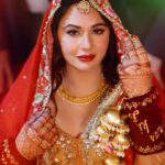 Mandy Takhar Instagram – #Redlove Continued ❤️ 

Photography ~ @sushildhimanphotography 

Wedding planners ~ @celebwise.media @chaudhary_dishu01 @harmanpreetsingh1717 

Glammed by ~ @sakshigupta_makeup_studio 
Desingers ~ @rachitkhannaofficial – Lehngha 
@surkhbyamrit – Duppatta
Jewellery ~  @nippyjewellers 
Jewellery ~ @omsons_bridal_store 
Mehndhi ~ @vickyguptamehandiarts

#Mansh #jaago