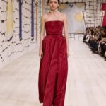 Maria Grazia Chiuri Instagram - ‘La Cigale’, a dress by Monsieur Dior from 1952, was an important influence in @MariaGraziaChiuri’s development of #DiorCouture Spring-Summer 2024. Its imposing architecture is seen reprised here in red moiré faille with more contemporary lines, a slimmed effect echoed by a tulle gown that recreates the twinkling embroideries of 1951’s ‘Mexique’ without the multilayered structure beneath. Among the other modern updates with heritage provence that came down the runway were polka dots and a caramel shantung #DiorBarJacket.