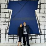 Maria Grazia Chiuri Instagram – Thank you to @michelgaubert for always capturing the mood of the show so well! 
Wearing custom @dior against @ducrotisabella ‘s beautiful installation 💙