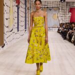 Maria Grazia Chiuri Instagram - The #DiorCouture garden blooms afresh for Spring-Summer 2024. Peppering Monday's show runway, looks by @MariaGraziaChiuri revived one of the House's fundamental codes, from the multicolored meadow blooming on a yellow faille bustier dress to the tulle and moiré two-piece embellished with floral motifs in an amalgam of silver threads, glass beads and tiny ribbed iridescent ribbons. Another bodice, meanwhile, represented a different kind of #DiorSavoirFaire, being composed of a profusion of flowers all hand-crocheted in an outstanding display of delicate dexterity and virtuosity.