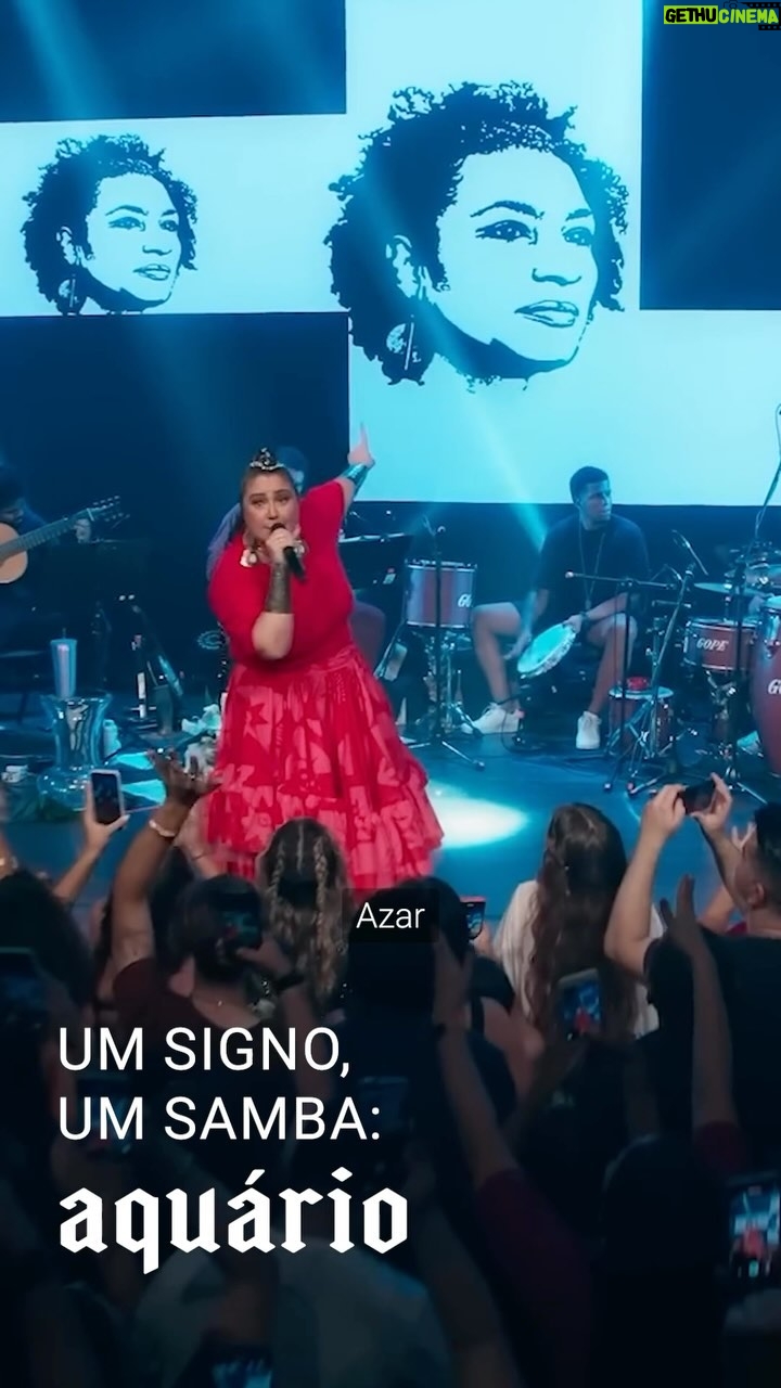 Maria Rita - 35.1K Likes - Em cada passo, a dança audaciosa na corda bamba da vida. Aquarianos, como equilibristas, acreditam que, mesmo nas dores, a esperança é a força que os impulsiona.
Lutando por um mundo mais justo, eles sabem que o show de todo artista, e de cada coração rebelde, precisa continuar.
#EMR
#PraTodosVerem Maria Rita cantando em cima do palco vestida de vermelho com a banda atrás. No telão atrás dela, um desenho de Mariele Franco.