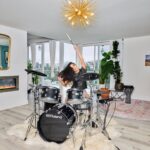 Marie Avgeropoulos Instagram – Playing to the beat of my own drums. 🥁

So loud, the whole neighborhood knows me. 😄 Proud to be part of @jimkrantzphoto “Hollywoodland: 100 Years – 100 Stories,” commemorating the iconic #Hollywoodland sign, which was established in 1923. 

Check out the stories of my fellow neighbors and I at www.jimkrantz.com. #womenwhodrum #drumlife #rolanddrums 

📸 @jimkrantzphoto
✨ @spraydisole
💄 @novakaplan