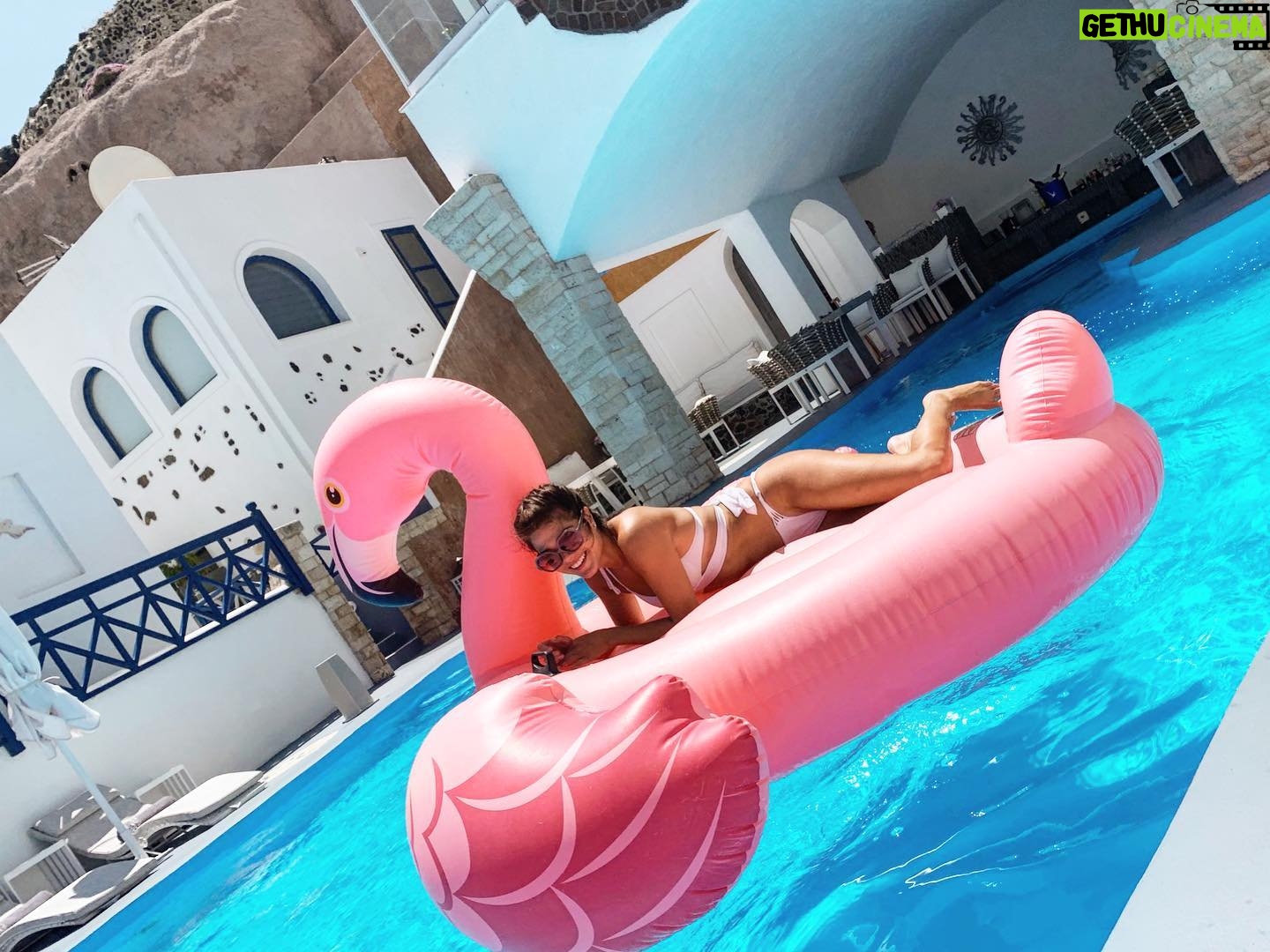 Marie Avgeropoulos Instagram - The time I tried to hold a ceremony on my big fat Greek flamingo in Santorini 🇬🇷🦩 . . . . . . . #greece #santorini #greekgirls #opa #summervibes