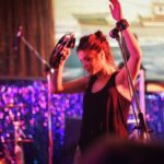Marie Avgeropoulos Instagram - For me jamming is always a why not question … 🎵🥁🎸🎤🎶🪘what are your fave songs to throw down ? . . . . . . . . #music #musicislife #jam #together #passion