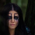 Marie Avgeropoulos Instagram - @shannonkook called me a tiger in the grass when he first met me . He took this pic during the finale and I think captured what he meant . May we meet again my friend ! #bts #the100 #octavia