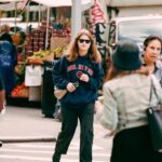 Marie Ulven Ringheim Instagram - i reached out to bella hadids paparazzis and said i needed to get some pics done 🤥🤣 ‘we fell in love in october’ Champion Hoodie out now !
