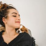 Mary Mouser Instagram - please ignore the über messy bun - but this is the only place I want to be for the rest of forever I HAVE BEEN CHOSEN AS A PERCH FOR THE HEAD OF THE ONE AND ONLY LADY CHARLOTTE - you can really tell by the giant smile I’m wearing in the second pic just how big of a deal each and every Lady cuddle is for me. how’s your Saturday? I’m a little bit tired but in the best way possible - so I’m catching up with some down time, coffee, and a good book 😌☕️📖