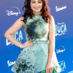 Mary Mouser Instagram - This night was the BEST. Luca is a new fave Disney movie of mine because: 1) The film was adorable and I connected in so many ways and also I cried (of course, it’s the magic of Pixar). 2) Everything was my favorite color (Blue). 3) They gave me delicious gelato at the end that stained my tongue blue (white chocolate and vanilla oat milk like, come ON!) 💙💚💙 Oh, also, @ashleymousermusic, remember that time we almost crashed a Vespa? 😎 (side note - I’m cracking up that it was caught on camera that I wore my Doc Martens most of the evening bc I am terrible at walking in heels and my Docs are my babies 😅) Stylist: @itsamandalim Dress: @notjustalabel Clutch: @tylerellisofficial Heels: @stuartweitzman