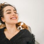 Mary Mouser Instagram - please ignore the über messy bun - but this is the only place I want to be for the rest of forever I HAVE BEEN CHOSEN AS A PERCH FOR THE HEAD OF THE ONE AND ONLY LADY CHARLOTTE - you can really tell by the giant smile I’m wearing in the second pic just how big of a deal each and every Lady cuddle is for me. how’s your Saturday? I’m a little bit tired but in the best way possible - so I’m catching up with some down time, coffee, and a good book 😌☕️📖