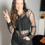 Mary Mouser Instagram - something about this fit really made me go 😋😜🤪 this is another tb, bc I feel like i didn’t get to show off this look enough. I’m obsessed with the ⚫️ and the earrings (can you spot the shape 🧐?) also, do you still have your holiday decorations up? I finally took mine down but the pumpkins and bats were hard to let go of 😭 hair: @michaelduenas make up: @courthart1 styling: @mrmontyjackson top: @lagencefashion jeans: @jbrandjeans earrings: @annasheffield