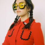 Mary Mouser Instagram - ❤️‍🔥👓🧨 I felt like I should be wreaking havoc on a famous chocolate factory w a golden ticket in hand for this shoot for @whowhatwear . photographer: @davidkatzinger styling: @laura_sophie_cox make up: @courthart1 hair: @_katthompson_ ‘fit: @vivetta @gucci @beladorajewelry