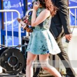 Mary Mouser Instagram - This night was the BEST. Luca is a new fave Disney movie of mine because: 1) The film was adorable and I connected in so many ways and also I cried (of course, it’s the magic of Pixar). 2) Everything was my favorite color (Blue). 3) They gave me delicious gelato at the end that stained my tongue blue (white chocolate and vanilla oat milk like, come ON!) 💙💚💙 Oh, also, @ashleymousermusic, remember that time we almost crashed a Vespa? 😎 (side note - I’m cracking up that it was caught on camera that I wore my Doc Martens most of the evening bc I am terrible at walking in heels and my Docs are my babies 😅) Stylist: @itsamandalim Dress: @notjustalabel Clutch: @tylerellisofficial Heels: @stuartweitzman