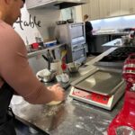 Maryse Mizanin Instagram - If you know me, you know i LOVE cooking! Maybe i get this from my dad, he was an AMAZING chef! I took @mikethemiz with me today and he gave new meaning to breaking bread 🥖 @surlatable