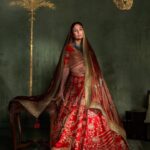 Masaba Gupta Instagram - A classic in red, the 'Baug-E-Bahaar Lehenga' is paired with a 'Son Chidiya' tissue dupatta. This look is designed for the woman who dreams of a wedding rooted in tradition and of course, loves red. The 'Son Chidiya' motif, a bird in flight, is hand-embroidered on the dupatta, symbolizing growth and freedom, making this a true 'sapno ka lehenga'. #TheMasabaBride #HouseofMasaba
