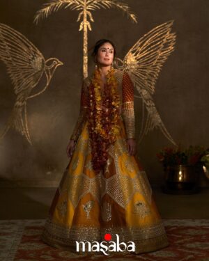 Masaba Gupta Instagram - Kareena in the ‘Ochre Neel-Kamal Lehenga’ embellished with some of my favourite motifs - ‘Son-chidiya, Neel-Kamal, Haathphool & Jaali.’

The lehenga is in three beautiful shades of yellow to represent the joy, hope and celebration associated with wedding festivities. 

This look was designed keeping a bride’s sangeet in mind, just fuss-free and beautiful. 

The collection is available at select @houseofmasaba stores and online.
