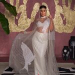 Masaba Gupta Instagram - For the bride’s 80s flapper girl style after party for when she is ready to unwind…or perhaps a modern day princess at a wedding party in the Hamptons? Kareena is stunning in the white ‘Son Chidiya’ cape set embellished in pearls and sitaras. #TheMasabaBride #HouseofMasaba