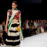 Masaba Gupta Instagram - All eyes on the pocket saree. My debut show at Lakmé Fashion Week GenNext program | Spring/Summer 2009. This was the first time the Pocket Saree made its debut on the runway and in the world, redefining everything the sari stood for & making it more palatable for a younger audience…something I believe in doing even today.
