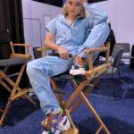 Meg Donnelly Instagram – performed at @disneyd23 in this jumpsuit as a tribute to Aaliyah. passed away 18 years ago today 💎🦋