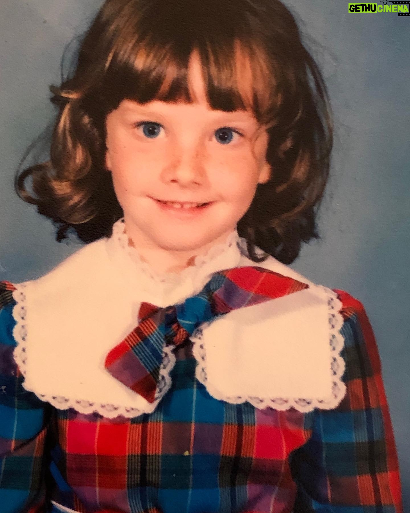 Melissa Rauch Instagram - #FBF Right before the school photographer snapped this pic he said, “Your bow is crooked.” I didn’t register what he meant and thought it was another way of saying: “Say cheese!” The look on my face is me trying to figure out how to respond. (Do I repeat back, “Your bow is crooked?!” Or do I say “MY bow is crooked?! Why can’t I just say “cheese?!”) He took a half a second more to try to explain it to me, but got fed up with my confusion and took the picture. As I was walking away he said, “Tell your mommy I tried to fix it.” I was panicked and further confused. He knew my mommy!? It wasn’t until we got the pictures back and saw the crooked bow that I understood what he had said. I was so upset with myself that I came home crying, devastated that I didn’t fix my bow before the picture. My mother told me that she loved it. “The crooked bow made it special,” she said. “You will look back on this picture one day and love it too.” She was right. May all your bows be crooked. 🎀