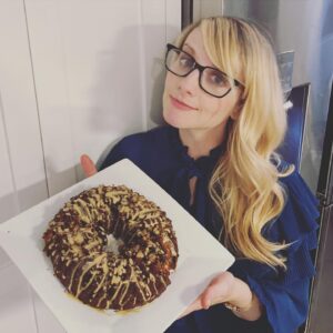 Melissa Rauch Instagram - Hope you had a wonderful Thanksgiving! Here’s the recipe for the Persimmon Cake with Cream Cheese Glaze I f’ed up on my stories:
- 3 Large ripe Persimmons (Hachiya not Fuyu - I'm not cursing you off I'm just telling you which works better. If I'm just eating a persimmon I prefer the fuyu & the hachiya's can go suck it. I know I'm gonna get hit hard from die hard hachiya fans, but I'm using the hachiyas in this recipe so maybe rethink calling me a jerk & just leave a nice 👍 or 💗)
- 2 cups Oat flour & 1/2 c almond flour
- 1/2 tsp baking soda
- 1 tsp baking powder
- 1/2 cup coconut sugar
- 1 tsp cinnamon, 1/4 tsp cloves, 1/4 tsp nutmeg, pinch of ginger
- 1 tablespoon vanilla
- 3 eggs
- 1/3 cup coconut oil
Glaze:
- container cream cheese (use dairy free if you wanna)
- juice of 1/2 lemon
- 1/4 cup coconut sugar
- 1 tsp tapioca flour 
Preheat oven to 325. Peel the persimmons. Take out any seeds. I really debated on whether to tell you to take out seeds as it's pretty self explanatory, but I was worried one of you would accidentally ingest a seed & I just can't handle taking on your shi%$# so I'm telling you to TAKE OUT ANY SEEDS. Put persimmon pulp in a food processor until pureed (*note: a food processor is not a word processor that you throw food on. Again, for the one person who would glob pulp on their keyboard, then blame me for ruining their computer.) Mix persimmon puree w/above ingredients until you have a cake batter. Grease bundt cake pan or any other cake pan you like that doesn't have an annoying spelling like "bundt." I don't think I greased it well enough, so just be better. Pour batter into WELL GREASED pan. Bake for an hour. 
I wasn't originally gonna do a glaze, but when my cake fell apart, I needed something to hide my failure. So, glaze: Blend coconut sugar & tapioca flour. Then mix with cream cheese & lemon. After the cake cools, flip it over. Hopefully yours came out better than mine. If it did, I don't wanna hear it. I'm just not that big of a person. Jackson Pollock that glaze all over the top or if you're not covering up your inadequacies like I was, you can gently pour it over as you pat yourself on the back for being so damn perfect.