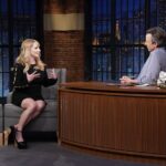 Melissa Rauch Instagram - Had so much fun talking to the wonderful @sethmeyers about all things #NightCourt Check it out tonight on @latenightseth on @nbc  Pic # 1: Talking with a lotta hands Pic #2: Hands getting more out of control Pic #3: Trying my best to wrangle said hands to prevent them from completely talking to Seth on their own. Big thanks to this dream team:  Styling: @hayley_atkin_ Hair: @matthewmonzon Makeup: @marywilesmakeup Photo credit: “Lloyd Bishop/NBC”