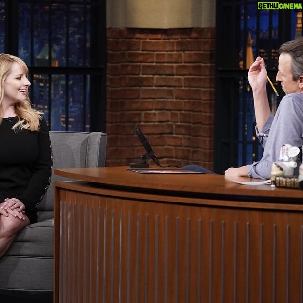 Melissa Rauch Instagram - Had so much fun talking to the wonderful @sethmeyers about all things #NightCourt Check it out tonight on @latenightseth on @nbc Pic # 1: Talking with a lotta hands Pic #2: Hands getting more out of control Pic #3: Trying my best to wrangle said hands to prevent them from completely talking to Seth on their own. Big thanks to this dream team: Styling: @hayley_atkin_ Hair: @matthewmonzon Makeup: @marywilesmakeup Photo credit: “Lloyd Bishop/NBC”