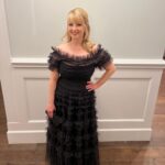 Melissa Rauch Instagram - Had such a lovely time presenting at #ASCAwards 🖤 Huge congratulations to all the gifted nominees and winners. And a shoutout to my awesome parents who logged on to the live stream of the awards, hours before it started “just in case,” to watch me present and take “pictures of the screen.”  Thank you to the wonders of: Styling: @hayley_atkin_ Hair: @jenniferguerrerohair Makeup: @barbi_fonte Dress: @needleandthreadlondon Able to reach podium: 6 inch heels 🤍🖤🤍🖤🤍🖤🤍🖤